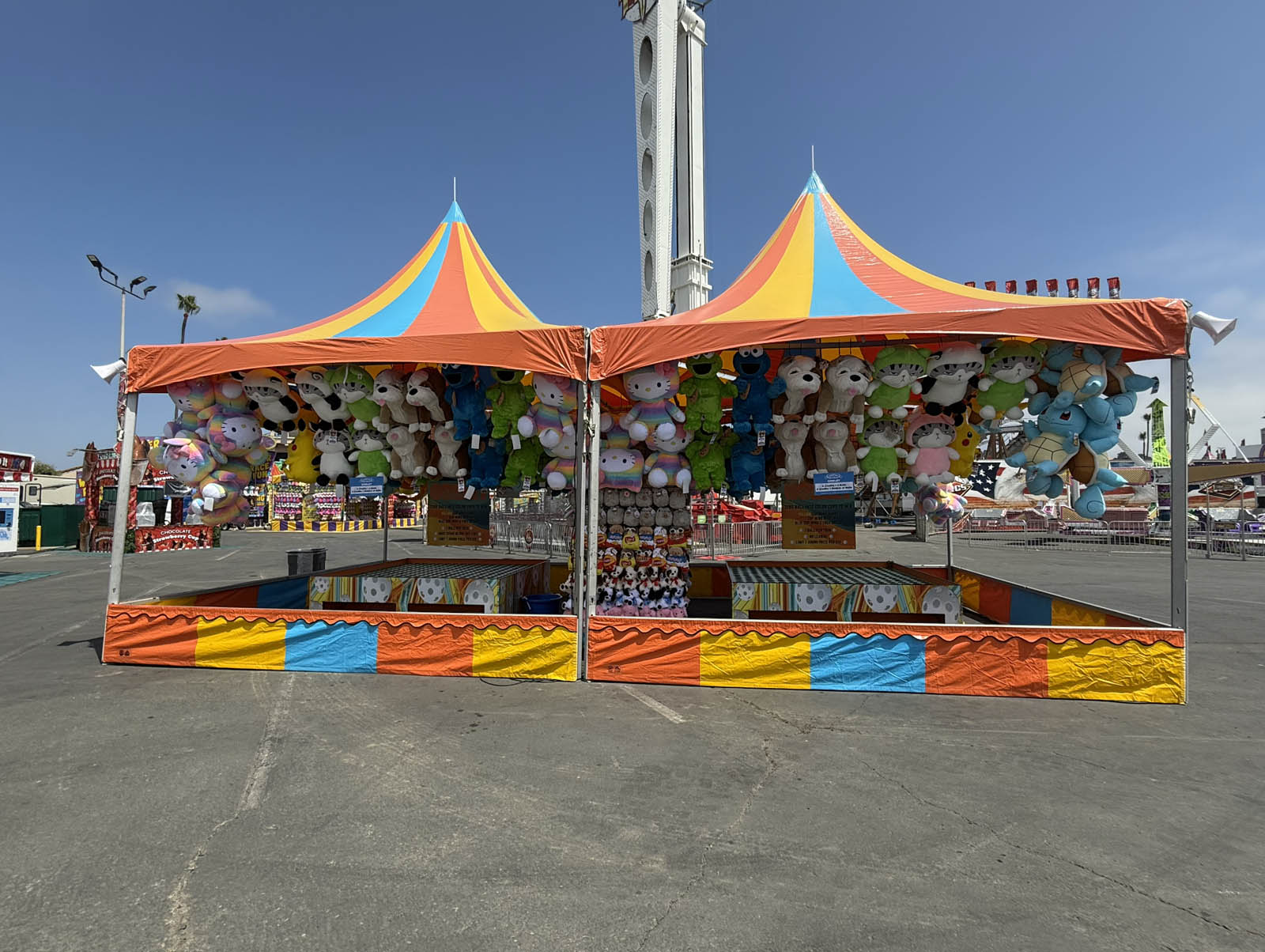 Plush prizes displayed at Goblet Toss game