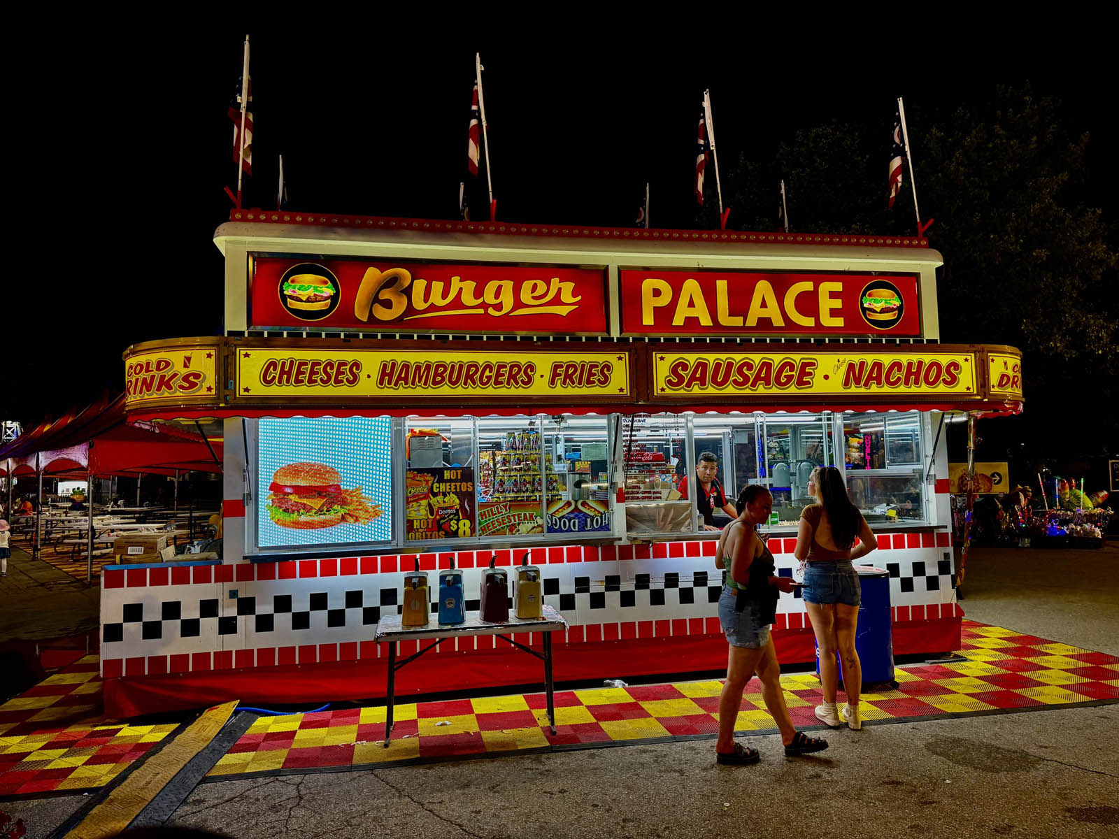Burger Palace concession stand serving burgers and fair food